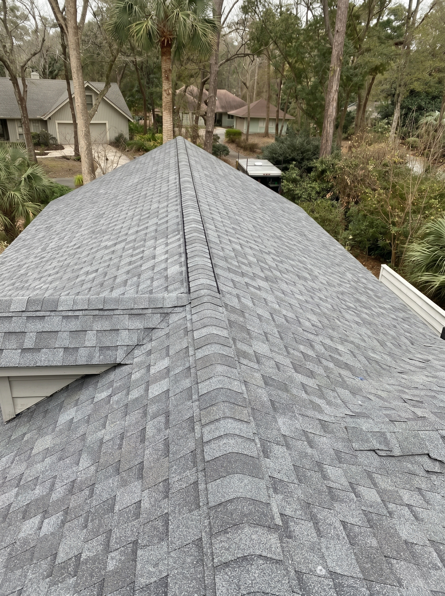 Completed CertainTeed Landmark architectural shingle roof, hip and ridge cap installed